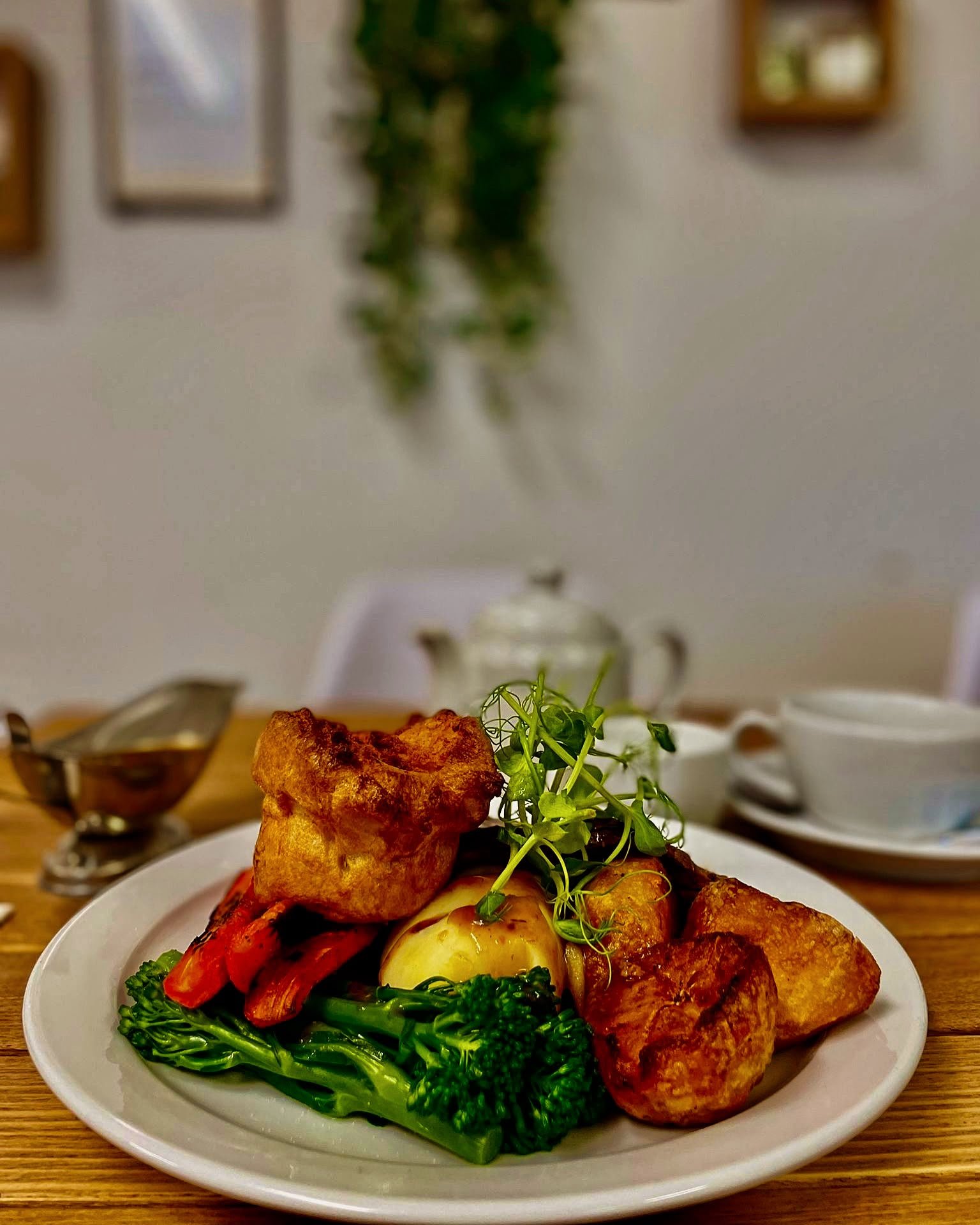 A Dan's Cafe Sunday roast with Yorkshire pudding, roast potatoes, carrots, tenderstem broccoli and pea shoots
